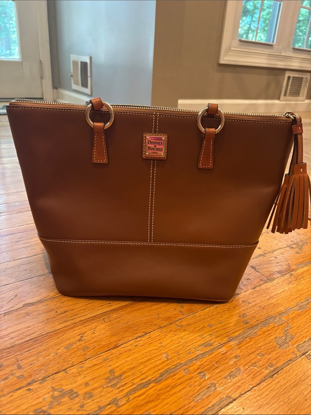 Dooney & Bourke Brown Leather Tote with Tassel Detail